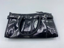 A black leather shoulder bag with a silver buckle, similar in style to brands like Nine West. A black leather shoulder bag with a silver buckle, similar in style to brands like Nine West.