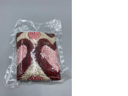 Heart-shaped rug or soft bath mat.