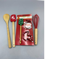 Set of 5 This holiday baking set includes 4 pieces: a festive-shaped silicone spatula, an egg whisk, and a Christmas-themed cookie cutter.