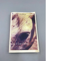 copy of the novel As I Lay Dying by William Faulkner, published as part of the "Vintage Faulkner" collection. 