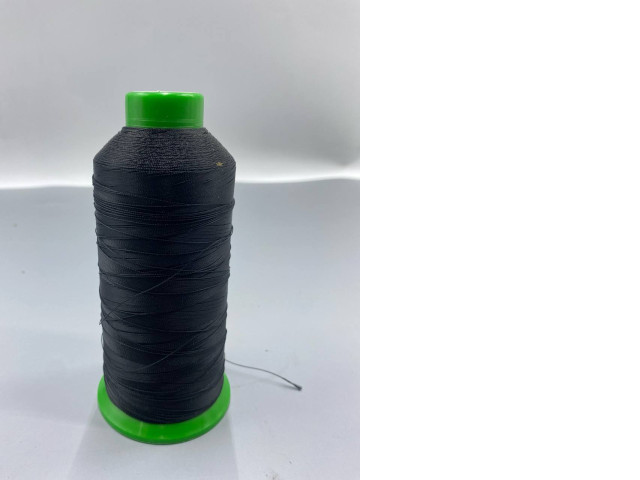 industrial sewing thread, likely bonded nylon or polyester, used for heavy-duty applications. industrial sewing thread, likely bonded nylon or polyester, used for heavy-duty applications.