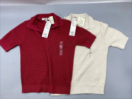 Set of 2  H&M women's short-sleeved ribbed polo shirts featuring a distinctive V-neck collar and a textured knit pattern. 