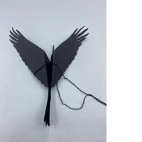  DIY papercraft raven or bird-shaped wind deterrent designed for gardens and patios