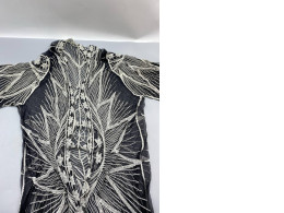 A sheer black kimono, similar to the one sold by Shein.