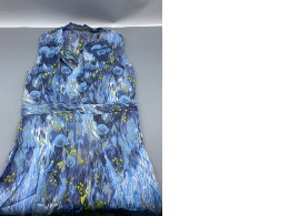 A blue dress with a nature-inspired pattern featuring flowers and trees.