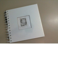 Spiral notebook + pen