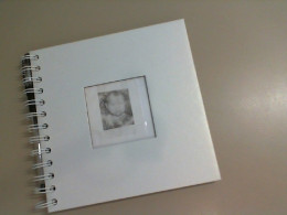 Spiral notebook + pen