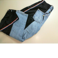 Trousers with denim inserts