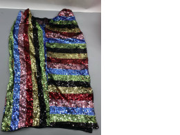 This rainbow-striped sequin fabric is often utilized for statement apparel like party dresses or skirts