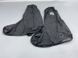 These black rain shoe covers are designed to be worn over regular shoes.