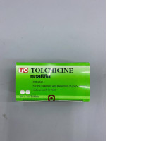 Packaging for tolchicine tablets, a medication used to treat and prevent gout flare-ups.