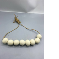 Decorative felt balls for tying curtains.