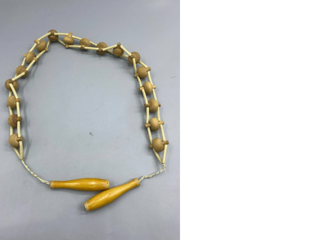 vintage-style wooden back massager or roller. vintage-style wooden back massager or roller.