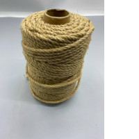 spool of natural jute twine or rope. spool of natural jute twine or rope.