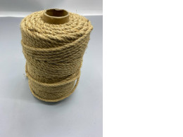 spool of natural jute twine or rope. spool of natural jute twine or rope.