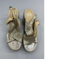 Gold metallic sandals by the brand NOW, made in Italy.