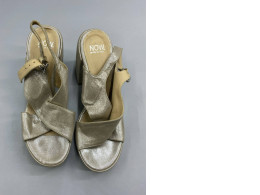 Gold metallic sandals by the brand NOW, made in Italy. Gold metallic sandals by the brand NOW, made in Italy.