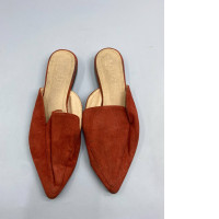 Douuod pointed-toe orange suede flat sandals.