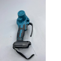 A portable power tool, perhaps a handle for a small chainsaw.