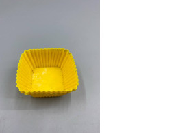 Set of 3 Yellow square silicone baking cups, often sold in sets for baking cupcakes or muffins. Set of 3 Yellow square silicone baking cups, often sold in sets for baking cupcakes or muffins.