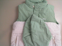 Women's vest jacket with a hood