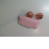 Women's glasses in a pink case