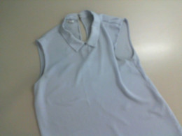 Light blue sleeveless women's blouse
