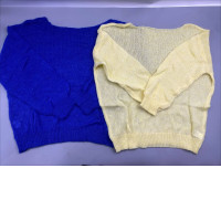 Set of 2 Women's fine knit sweaters or cardigans in blue and cream colors. Set of 2 Women's fine knit sweaters or cardigans in blue and cream colors.