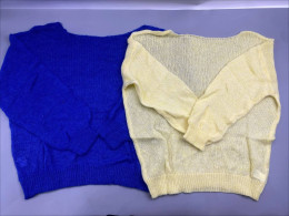Set of 2 Women's fine knit sweaters or cardigans in blue and cream colors. Set of 2 Women's fine knit sweaters or cardigans in blue and cream colors.
