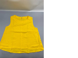 A bright yellow sleeveless top or tunic, similar in style to the FLAX brand.