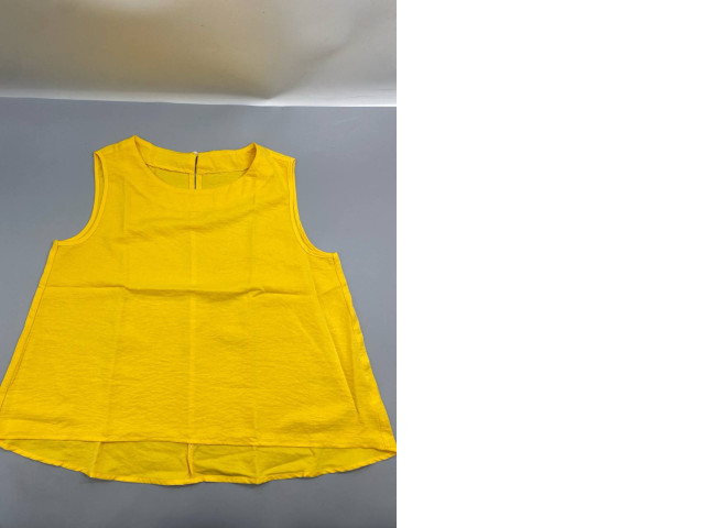A bright yellow sleeveless top or tunic, similar in style to the FLAX brand. A bright yellow sleeveless top or tunic, similar in style to the FLAX brand.