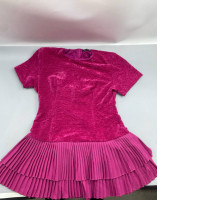 A form-fitting casual dress that accentuates the figure, featuring a beautiful patchwork design from the French brand Aveloria.