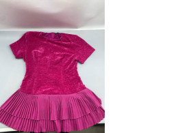 A form-fitting casual dress that accentuates the figure, featuring a beautiful patchwork design from the French brand Aveloria.