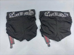 Set of 2  ROMWE women's shorts featuring a rhinestoned "CatLady" design on the waistband. 