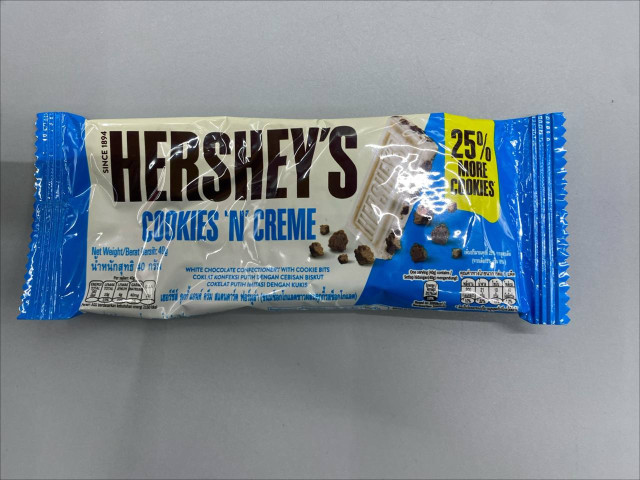 Hershey's Cookies 'n' Creme bar, which is a white chocolate Hershey's Cookies 'n' Creme bar, which is a white chocolate
