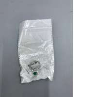 Fashion ring with green beads.