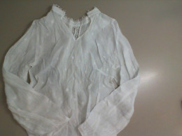 White women's blouse with long sleeves
