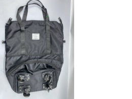 A foldable and expandable duffel bag with wheels for use as a wheeled suitcase. A foldable and expandable duffel bag with wheels for use as a wheeled suitcase.