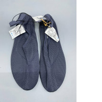 The Decathlon Aquashoes 100 in grey are designed for water sports such as snorkeling.