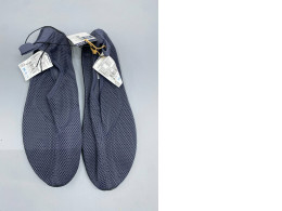 The Decathlon Aquashoes 100 in grey are designed for water sports such as snorkeling.