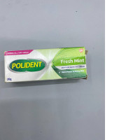 Polident Fresh Mint Denture Adhesive Cream. 