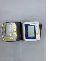 Set of 2 Wrist blood pressure monitors: The one on the left is a Rossmax brand, and the one on the right is an A&D Medical UB-202.