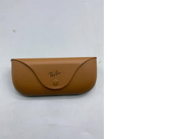  brown Ray-Ban Meta charging case designed for both Gen 1 and Gen 2 smart glasses. 