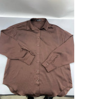 It appears to be a brown satin, long-sleeved, button-down shirt in a style typical of the UNIQLO brand.