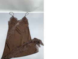 An asymmetrical lace dress from Zara's ZW collection.g