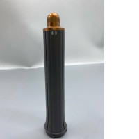 The Dyson Airwrap Long Barrel brush head is typically copper or nickel-colored.