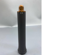 The Dyson Airwrap Long Barrel brush head is typically copper or nickel-colored.