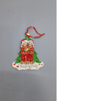 Christmas decorations in the shape of a couple wearing matching red pajamas and slippers.