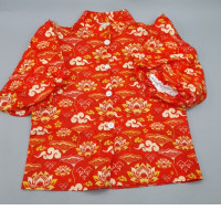 Red long-sleeved shirt with traditional pattern.