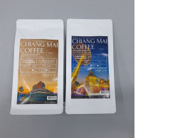 Set of 2 Medium-roasted Karnapura coffee from Chiang Mai, Thailand, specifically the Thepsadet variety.